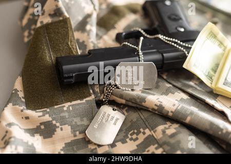 LE concept MILITAIRE AMÉRICAIN : arme à feu, uniforme militaire. Banque D'Images