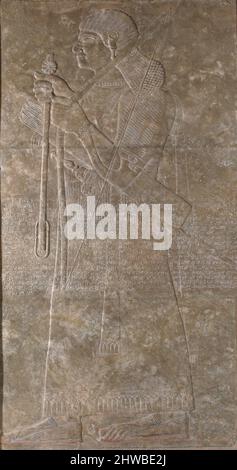 Préposé à la personne portant un arc, des flèches et une Mace Banque D'Images