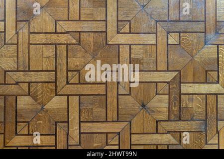 Parquet en bois naturel blanchi vintage à chevrons Banque D'Images