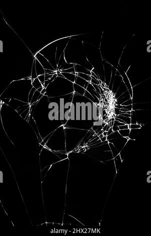 Fissures cassées verre effet de fracture texture isolée abstrait noir fond. Banque D'Images