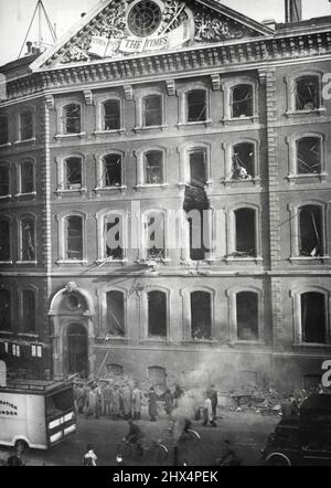 Des bombes ont endommagé le siège du Times à Londres lors d'un RAID récent. Des dégâts causés par des bombes ont été causés au siège social de « The Times » à Londres lors D'Un récent raid à Londres. La bombe a frappé le centre du bâtiment principal et a endommagé les services de rédaction, de gestion et autres. 01 janvier 1941. (Photo par photo de presse associée). Banque D'Images