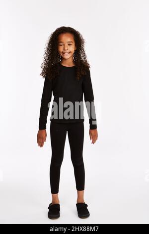Fille tenue noire. 8 ans Banque D'Images