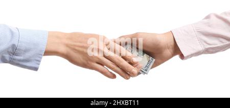Mains de femmes avec des billets de banque en dollars sur fond blanc Banque D'Images