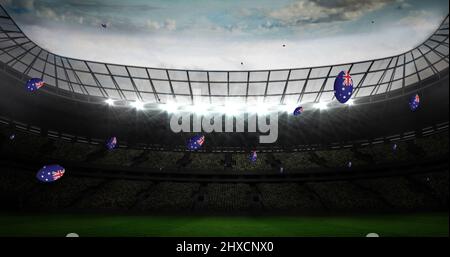 Image des balles de rugby colorées avec le drapeau de l'australie au stade Banque D'Images