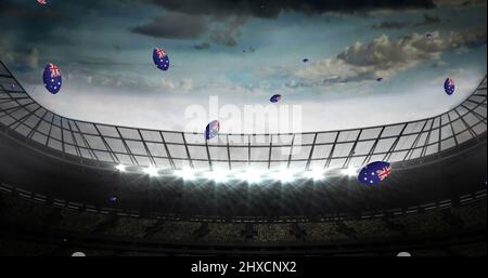 Image des balles de rugby colorées avec le drapeau de l'australie au stade Banque D'Images