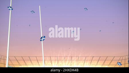 Image de ballons de rugby colorés avec le drapeau de l'écosse au stade Banque D'Images