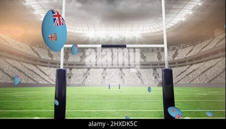 Image des balles de rugby colorées avec le drapeau des fidji au stade Banque D'Images