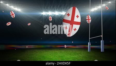 Image de ballons de rugby colorés avec le drapeau de la géorgie au stade Banque D'Images