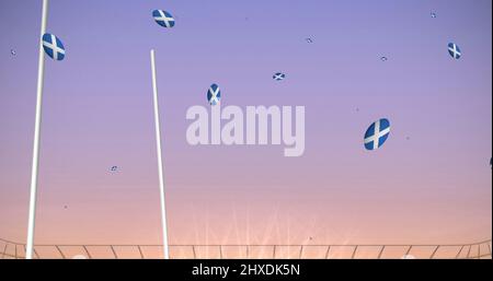 Image de ballons de rugby colorés avec le drapeau de l'écosse au stade Banque D'Images