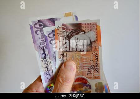 Gros plan de billets de dix et vingt livres. Banque D'Images