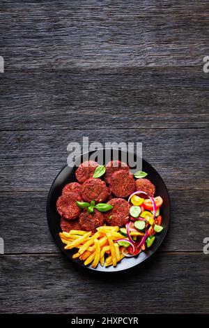 hamburger végétarien aux pois chiches et aux frites Banque D'Images