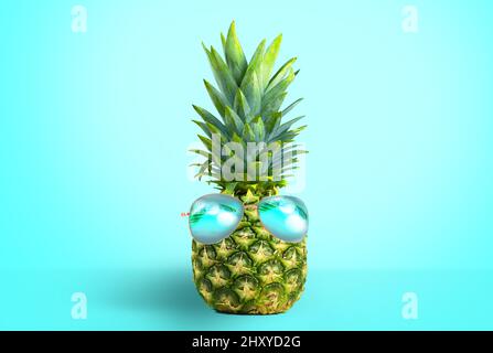 Ananas mûr avec lunettes de soleil sur fond bleu. Concept d'été. Banque D'Images