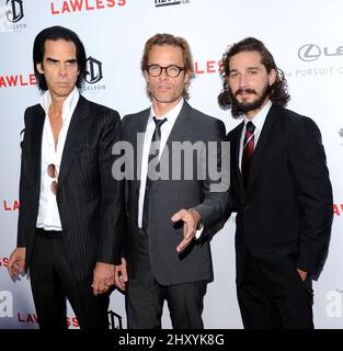 Nick Cave, Guy Pearce et Shia LaBeouf assistent à la première « Lawless » qui s'est tenue à l'ArcLight, Los Angeles. Banque D'Images