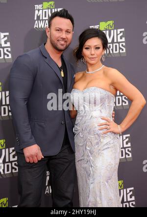 Jenni 'JWoww' Farley et Roger Matthews arrivent aux MTV Movie Awards 2013 à Sony Pictures Studios le 14 avril 2013 à Los Angeles, Californie. Banque D'Images