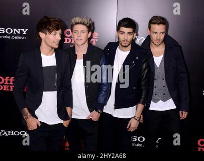 Louis Tomlinson, Niall Horan, Zayn Malik, Liam Payne d'une direction assister à la première "une direction: C'est nous" à New York. Banque D'Images