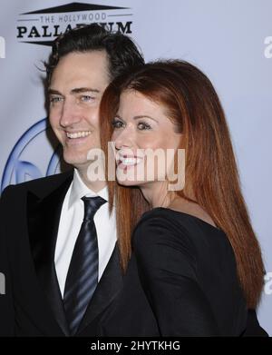 Daniel Zelman et Debra messing aux Prix annuels de la Guilde des producteurs 20th qui se tiennent au Palladium, à Hollywood. Banque D'Images