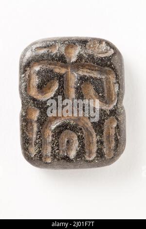 Cachet, Tabloïd. Iran ou Mésopotamie, fin du millénaire 4th-2nd. Outils et équipement; joints. Serpentin noir Banque D'Images