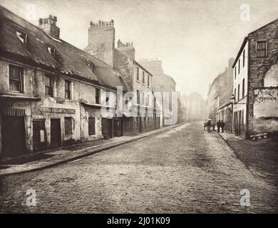 Main Street, Gorbals, vers le sud (n° 36). Thomas Annan (Écosse, Glasgow, 1829-1887). Écosse, 1868, imprimé en 1900. Photographies. Photogravure Banque D'Images