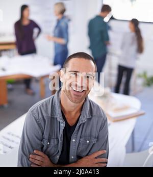 HES un membre de l'équipe. Portrait d'un architecte debout en Banque D'Images