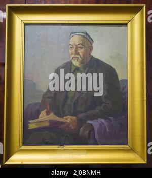 Un portrait, photo du célèbre écrivain ouzbek Muminjon Muhammadiev. Peinture de l'artiste V Odilov. Au musée de littérature de l'État d'Alisher Navoi Banque D'Images