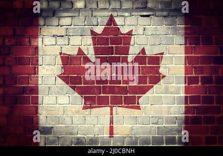Grunge Canada drapeau sur un mur de briques Banque D'Images