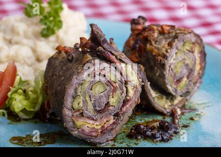 Roulade de bœuf avec purée de pommes de terre Banque D'Images