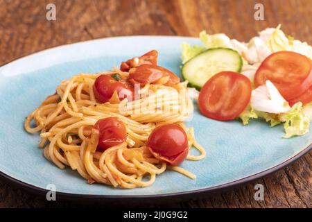 Spaghetti mit Kirschtomaten Banque D'Images