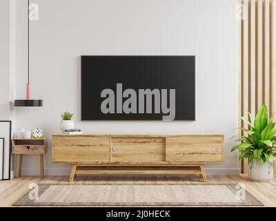 Téléviseur LED sur le meuble dans le salon moderne sur fond de mur blanc, rendu 3D Banque D'Images