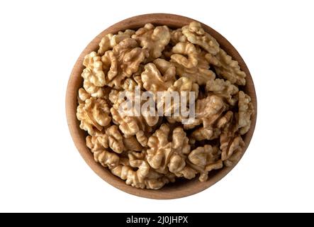 Bol plein de noix pelées sur fond blanc, vue de dessus Banque D'Images
