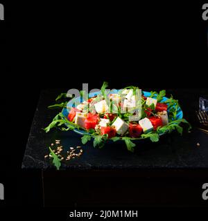 Salade de pastèque au roquette et au fromage feta Banque D'Images