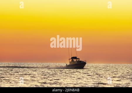 Pêche au large de la côte mexicaine à Sunrise pendant vos vacances Banque D'Images