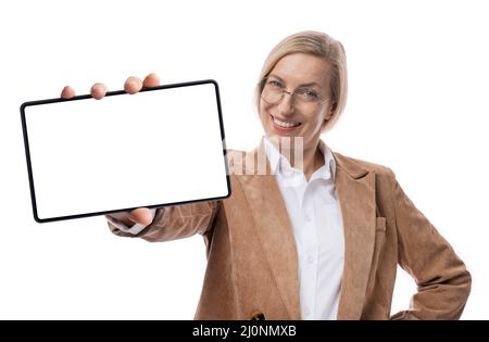 Femme d'affaires tenant une tablette vierge Banque D'Images