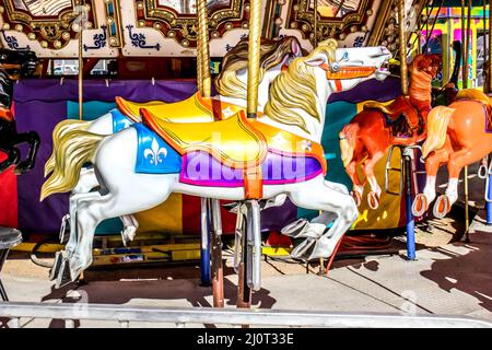 White Wooden Horse on County Fair Merry Go Round Banque D'Images