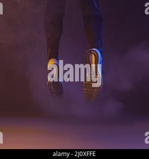 Les jambes sautent fument. Photo de haute qualité Banque D'Images