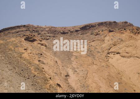 Falaise dans l'îlot de Montana Clara. Réserve naturelle intégrale de Los Islotes. Îles Canaries. Espagne. Banque D'Images