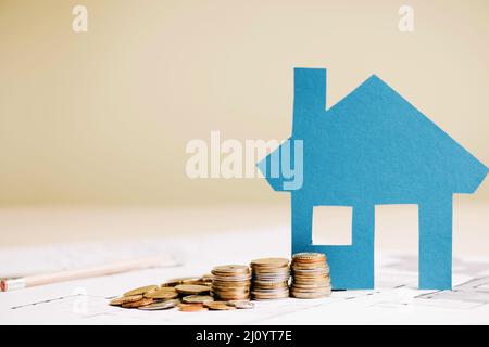 Photocalque de pièces de monnaie maison bleue. Photo de haute qualité Banque D'Images