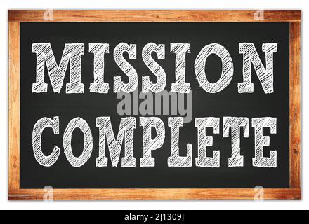 MISSION COMPLÈTE écrite sur le tableau noir de l'école à cadre en bois Banque D'Images