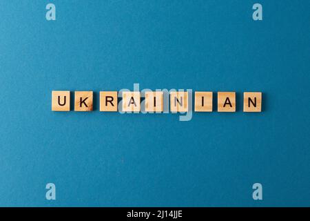 Origine ukrainienne. Expression de lettres en bois. Mots de la vue de dessus. Les phrases sont présentées dans une lettre en bois. Motivation. Banque D'Images