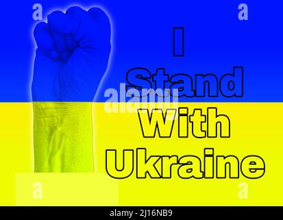 The Man's Fist with A Flag of Ukraine Isolated on I Stand with Ukraine Text Ukraine Flag Color Background Banque D'Images