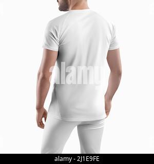 Maquette d'un pantalon et d'un t-shirt sportswear pour Homme. Modèle blanc sur un homme isolé en arrière-plan. Vue arrière. Banque D'Images