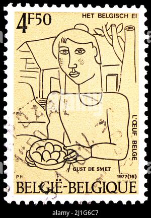 MOSCOU, RUSSIE - 10 MARS 2022: Timbre-poste imprimé en Belgique montre femme avec oeufs (1928) par Gustave de Smet (1877-1943), vers 1977 Banque D'Images