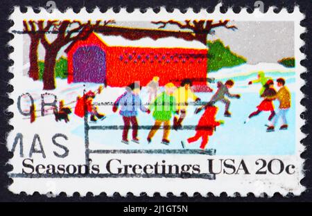 ÉTATS-UNIS D'AMÉRIQUE - VERS 1982 : un timbre imprimé aux États-Unis d'Amérique montre People Skating, Noël, vers 1982 Banque D'Images