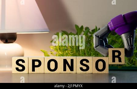 Le mot des SPONSORS sur le concept de tuiles de bois. Banque D'Images