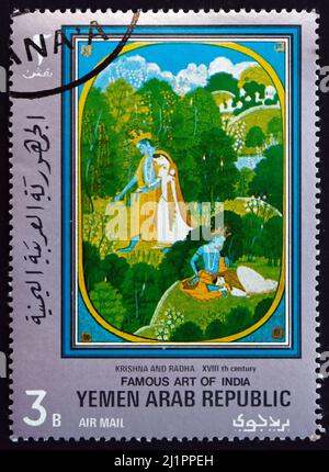 YÉMEN - VERS 1971 : un timbre imprimé en République arabe du Yémen montre Krishna et Radha, 18th siècle, peinture indienne, vers 1971 Banque D'Images