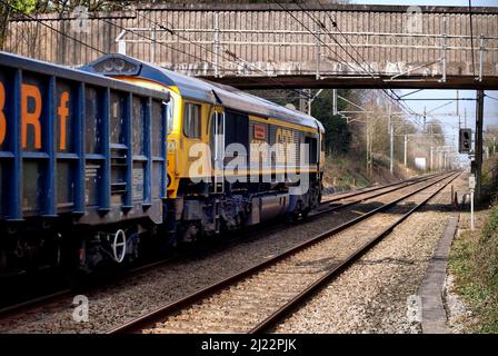 Hams Hall à Dowlow train de pierre se vide en passant par Alderley Edge, Cheshire. Classe 66 locomotive n° 66745 'chemins de fer de Modern - les 50 premières années'. Banque D'Images