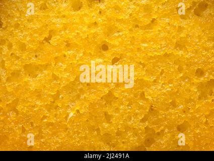 Texture d'arrière-plan de gros plan du gâteau en éponge jaune. Banque D'Images