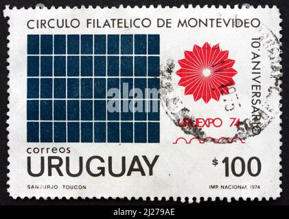 URUGUAY - VERS 1974: Un timbre imprimé en Uruguay montre URUEXPO 74 Emblem, UUEXPO 74 exposition philatélique, vers 1974 Banque D'Images