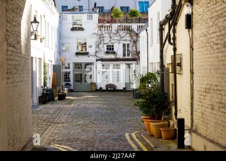 Charmant et pittoresque Sussex Mews West, un petit cul-de-sac résidentiel pavé près de Hyde Park à Londres. Banque D'Images