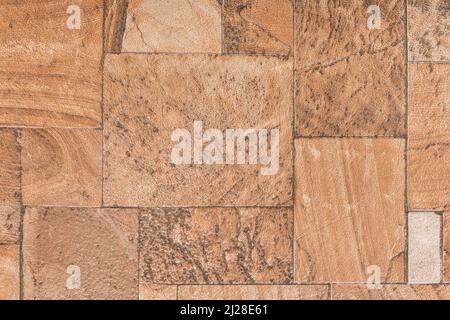 Carrelage brun avec fond de texture de surface à motif carré en pierre abstrait. Banque D'Images