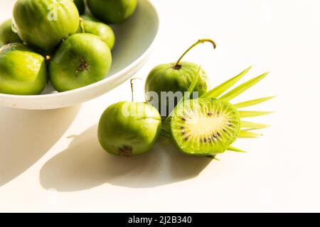 Encore la vie, mini kiwis fruits Banque D'Images